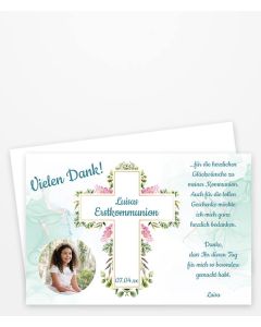 Dankeskarte zur Erstkommunion mit einem blumenumrandeten Kreuz und rundem Fotoausschnitt.